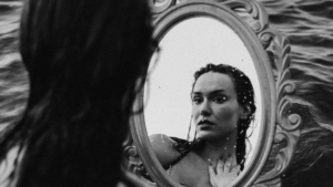 Woman seeing herself clearly